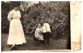 RPPC Postcard Woman in White Dress Looking at Scruffy Kid &amp; Dad w Bowtie Suit - £7.87 GBP