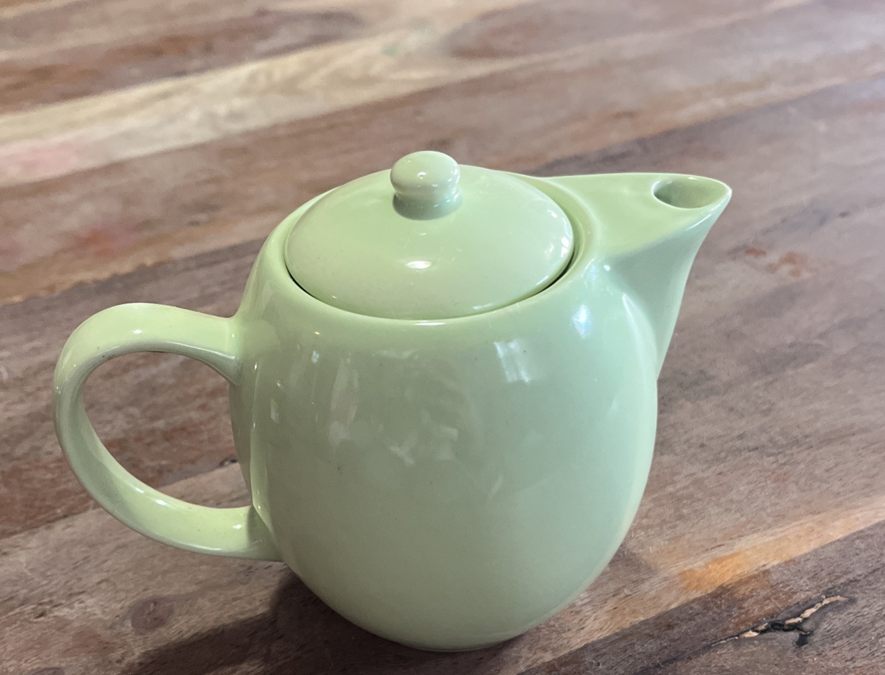 1940&#39;s to &#39;50&#39;s ceramic pastel green small teapot with lid &amp; metal strainer - $18.50