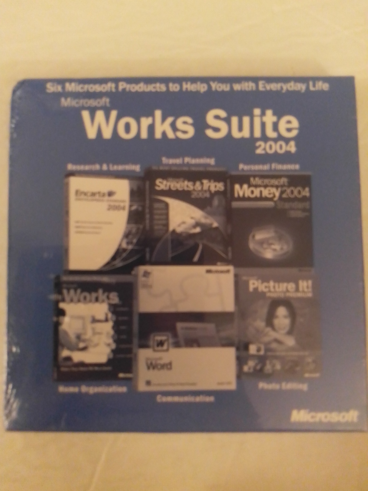Primary image for Microsoft Works Suite 2004 CD-ROM Set Brand New Factory Sealed With Word Key