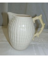 Vintage Pottery by Belleek Ireland Limpet Yellow 32 Oz Milk Jug Pitcher ... - $1,924.55 MXN