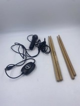 Rock Band Accessories Logitech Microphone and 2 Sets of Drum Sticks - $14.00