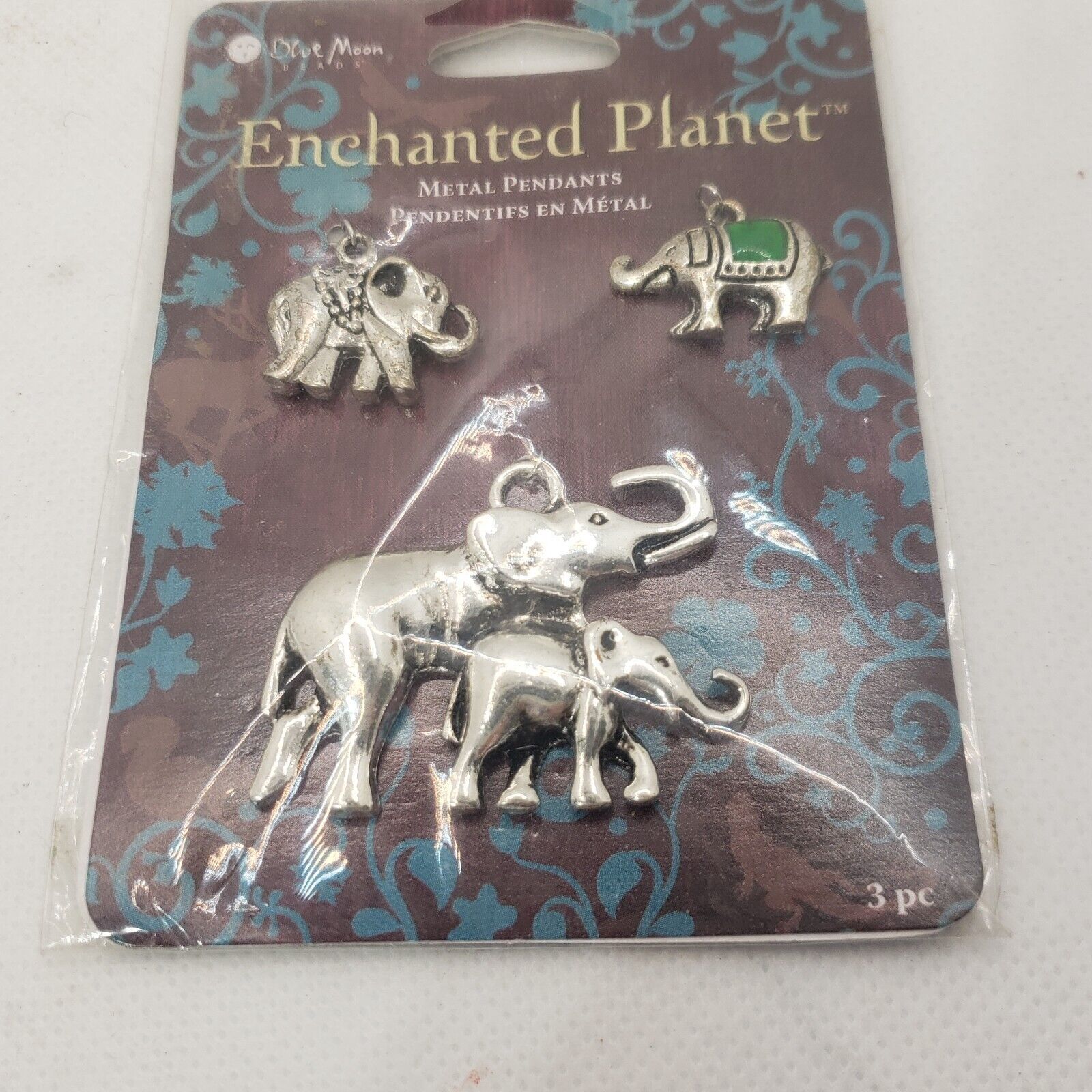 Elephant charm lot of 3 Blue Moon Enchanted Planet metal pendants - $11.18