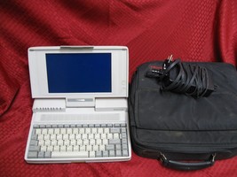Toshiba T1200XE with charger toshiba bag Item - Broken For Parts - $118.79