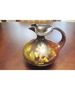 Lowelsa Weller ewer features a  orange-brown flowers on dark chocolate b... - $289.19 CAD