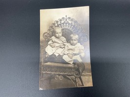 Antique B&amp;W Photo Postcard Of Two Children On Ornate Chair Early 1900s E... - £15.41 GBP