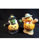 Pair of bisque Halloween figurines scarecrow &amp; wicked witch in pumpkins ... - $6.95