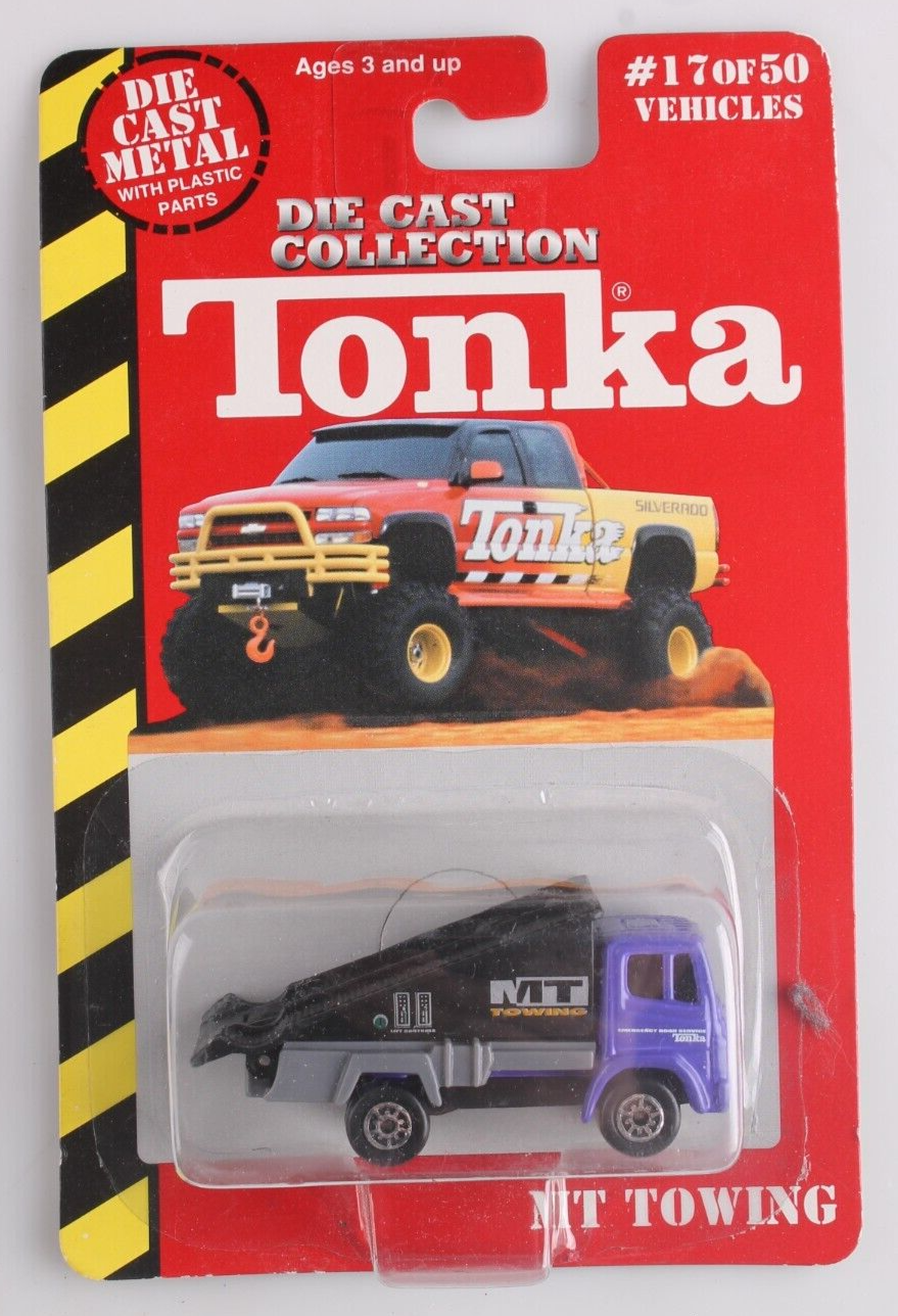 Tonka Maisto #17 OF 50 MT Towing Flat Bed Truck SEALED ON CARD 1999 - $9.90