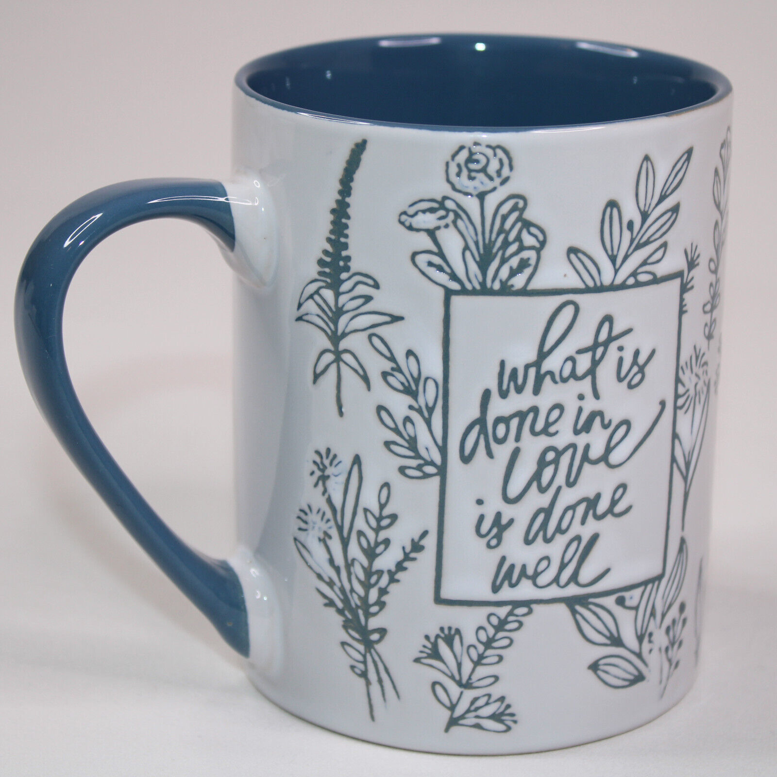 Primary image for “What Is Done In Love Is Done Well” White And Blue Floral Cup Quoted Coffee Mug 