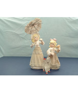 Vintage bisque blond hair mother daughter figurine pair with parasol poodle - $535.39 MXN