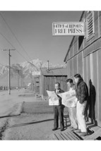 Roy Takeno and a group reading the Manzanar paper 20 x 30 Poster - £20.74 GBP