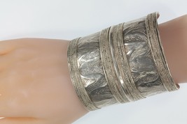 Authenticity Guarantee 
Antique Wide Afghan Engraved Silver Cuff Bracele... - $571.72