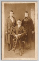 RPPC Three Young People Man Women Coats Studio Real Photo C1918 Postcard A22 - £5.55 GBP