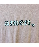 Novelty Amen. Cowhide Print Short Sleeve T-Shirt Size L EUC - $266.66 MXN
