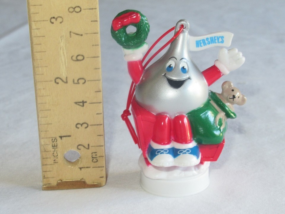 Christmas Ornament 1994/1995 Hershey&#39;s Kiss as Santa Toy Bag Wreath Tedd... - $9.43