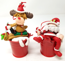 Drunk Santa Sledding Reindeer Ornaments Metal Cartoon Vintage Set of 2 - £12.16 GBP