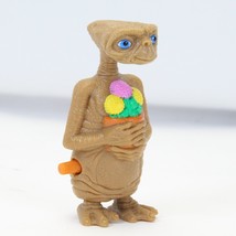 ET Alien Wind-Up Toy Figure 1980s Collectible Holding Flowers Excellent ... - £12.37 GBP