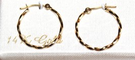 Solid 14K yellow gold marked 14K flawless twist hoop Earrings - $258.55