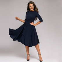 Classic navy blue midi-length swing dress with 3/4 sleeves - $65.99