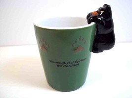 Ainsworth Hot Springs BC Green ceramic shot glass black figural bear on rim paws - £7.29 GBP