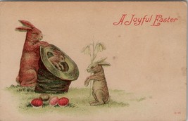 Easter Greetings Baby Rabbit in a Hat Colored Eggs c1910 Postcard U15 - £4.70 GBP