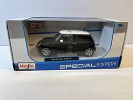 Mini Cooper Diecast Model Car: 1/24 Scale, New In Box By Maisto - $24.75