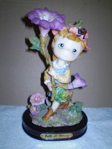 Belle &amp; Benny Figurine/ fairy holding a beautiful flower - £38.96 GBP