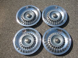 Factory 1964 Chrysler Imperial 15 inch spinner hubcaps wheel covers blemished - £110.64 GBP