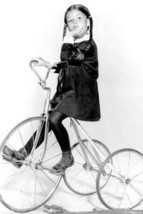 Lisa Loring in The Addams Family as Wednesday sitting on tricycle 24x36 Poster - $29.99