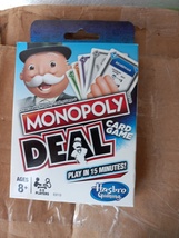 Monopoly deal, texas hold&#39;em set, card decks, pong balls+ silver trivial pursuit - £31.16 GBP