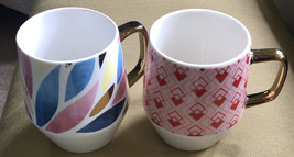 Two (2) large volume angular design mugs with gold handles - $26.00