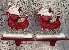 2 Vtg Santa in Sleigh Christmas Stocking Hanger Holder Cast Iron Base Heavy - $23.71