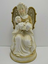 Christmas Musical Figurine w/ Angel Holding Baby Gold &amp; White - $197.78 MXN