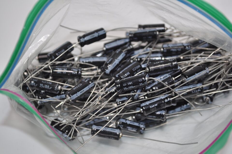 Primary image for Lot of Approx 50 SME 100uf 25v Capacitors