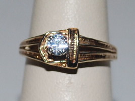 10K Yellow Gold Ring With A Solitaire Cubic Zirconia Set In A Belt Like Design - £106.23 GBP