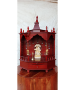 The temple is made of wood and brown color. It has 1 drawers, 1 puja she - $357.24 CAD+