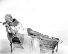 Rhonda Fleming glamour pose lying on sofa showing legs 5x7 inch photo - $7.99