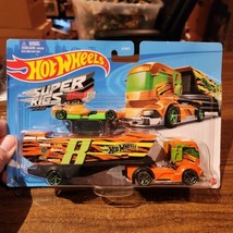 NEW 2021 Hot Wheels Hauler Super Rigs Big Rig Heat Transport w/F1 Racer ... - £7.23 GBP