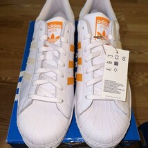 Size 12 Adidas Superstar &quot;White Ecru Tin&quot; Orange Leather Shoes GZ3737 - $1,347.46 MXN
