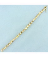Designer X and O Diamond Tennis Bracelet in 14k Yellow Gold - $71,902.72 MXN