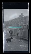 black &amp; white negative - lady scottie dog next to car trailer on wooded ... - $8.00