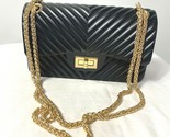 Details NC Black Rubber Purse with Gold Chain Straps - $18.99