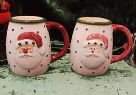 Two Hermitage Pottery Cheryl Schwier Limited Edition Embossed Santa Mugs  - $19.95