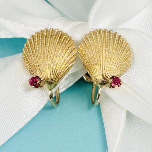 Authenticity Guarantee

Tiffany &amp; Co 18K Yellow Gold Clam Oyster Shell E... - $989.00