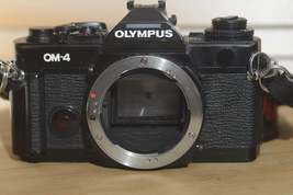 Black Olympus OM4 SLR Camera Body With Olympus Strap. In Fantastic condition. - $400.00