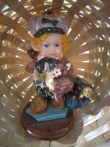 Child With Hat  And Backpack With Dog In It Figurine - $8.00