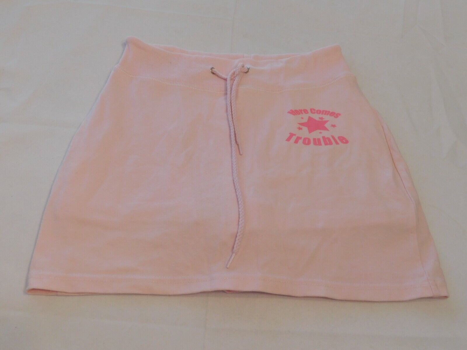 Primary image for Lee Sport Girl's Youth Skirt Skort Size S 7/8 Lt Pink "Here Comes Trouble"  GUC