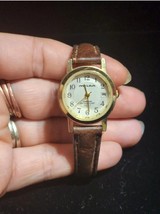 Milan Womens Watch Date Indicator Goldtone Bezel Brown Faux Leather Band - $12.40