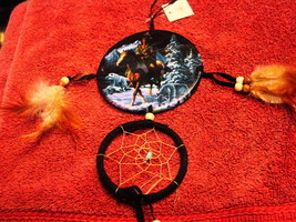 DREAMCATCHER WITH A PICTURE OF AN INDIAN RIDING A HORSE AND WOLVES - $9.38