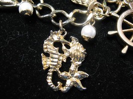 Nautical Beach Charm Bracelet Goldtone Anchor Sea Horse Wheel Fish Pearls Shell - £10.17 GBP