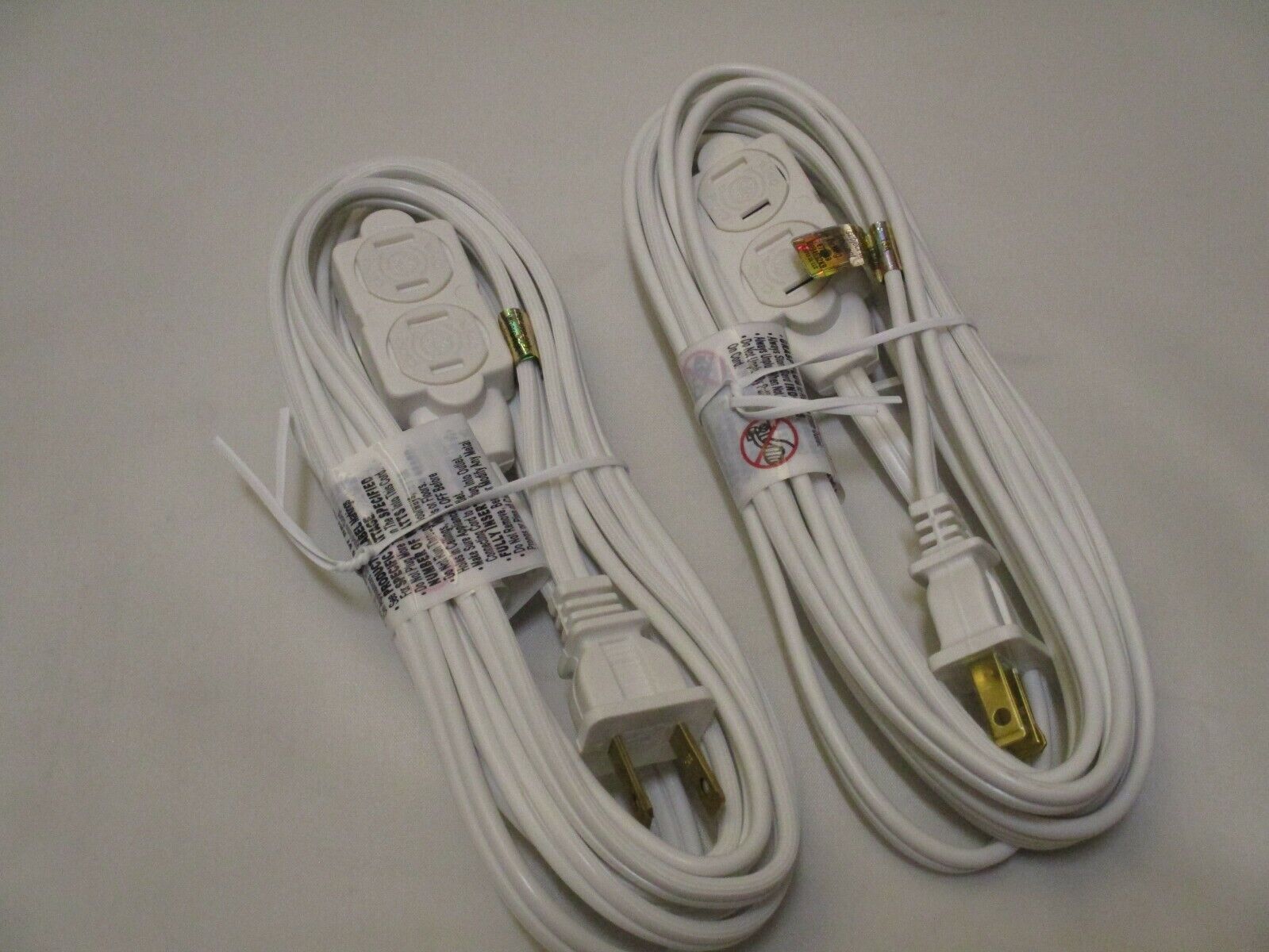 GE 12 Ft 3 Outlet Power Strip, 2 Prong 16 Gauge Twist-to-Close Cover, 2 Pack - $17.95